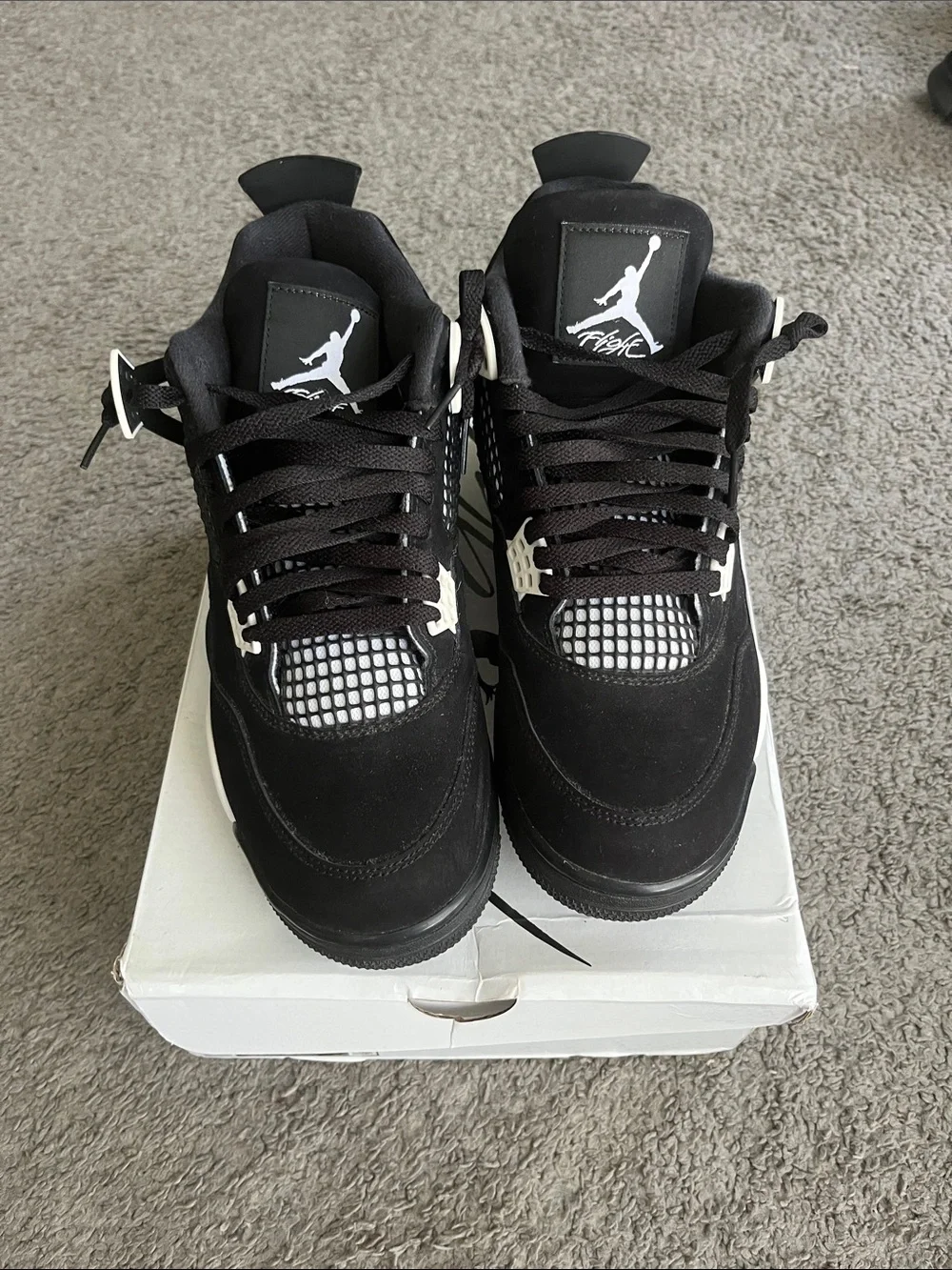 AIR JORDAN 4 RETRO Men’s Black and White Sneaker